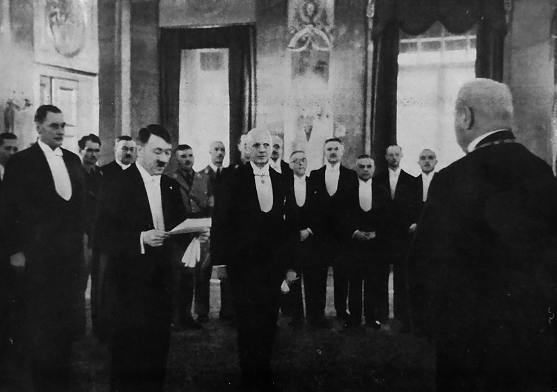 Adolf Hitler at the New Year reception for the diplomatic corps, presents his greetings to president Hindenburg